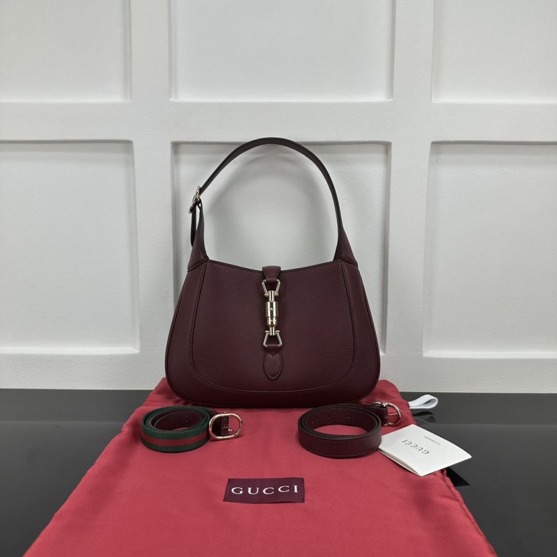 G*u*i top handle bags